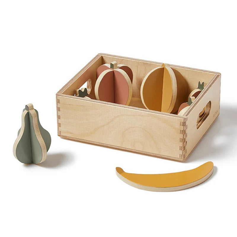 The Flexa Fruits Wooden Play Set by Flexa includes a box with slots and colorful, sliced wooden toy fruits—pear, peach, orange, and banana—ideal for play kitchens and teaching kids about healthy eating.