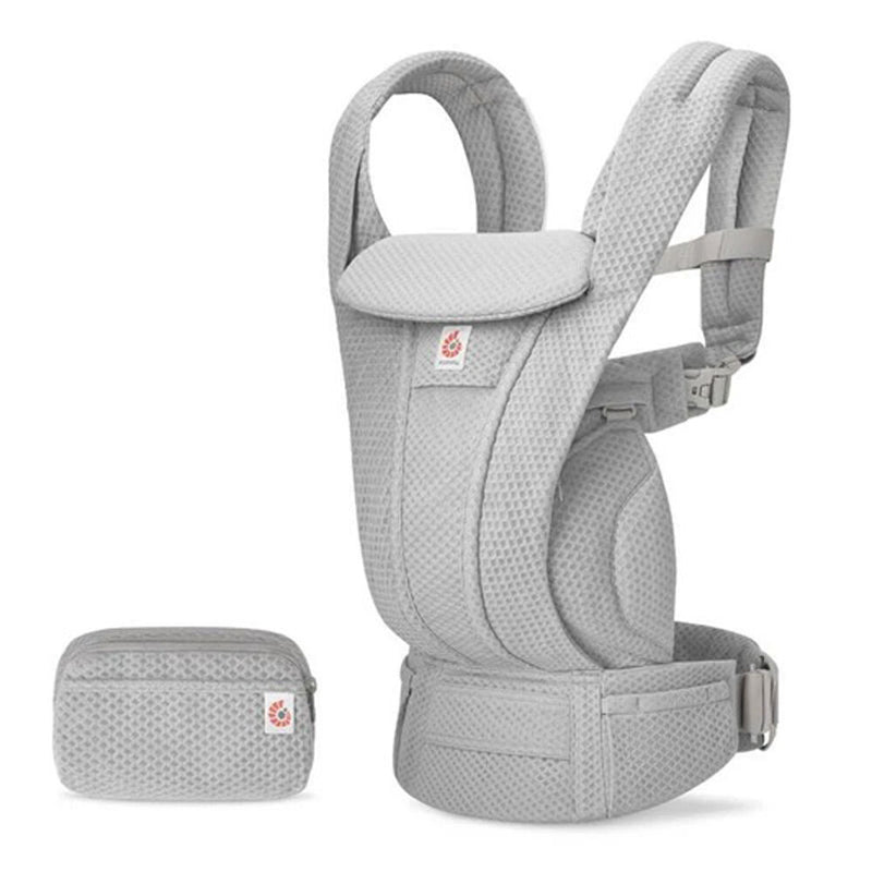 A light gray Ergobaby Omni Deluxe All-In-One Baby Carrier with padded straps and adjustable buckles is shown beside a matching small zippered pouch. Both items, by Ergobaby, appear to be made of breathable mesh fabric.