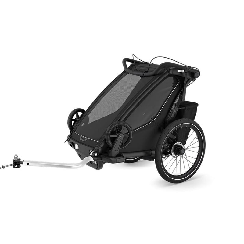 The Thule Chariot Sport V2 2025 Single Black is a modern, modular two-wheeled bike trailer with a mesh cover for carrying children and a hitch arm for easy bike attachment.