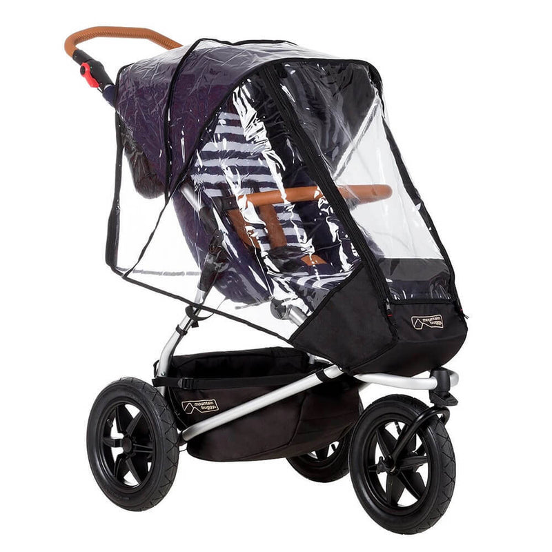 The Mountain Buggy Storm Cover shields your Mountain Buggy stroller from the elements, protecting the seat and handlebar while maintaining visibility.