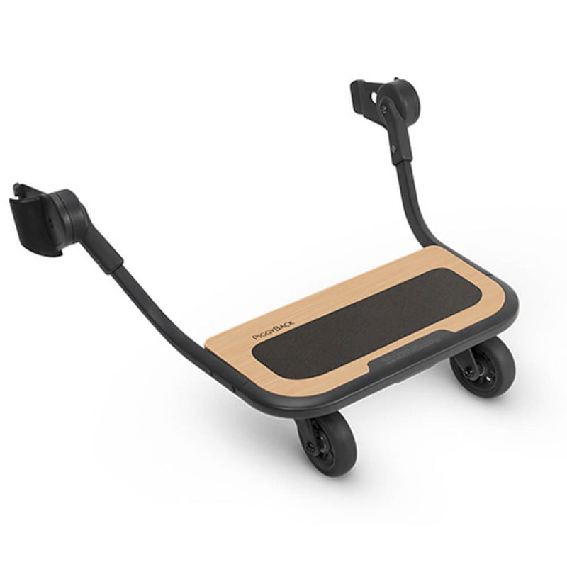 The UPPAbaby Piggyback Board VISTA is a two-wheel board with a black frame and wooden non-slip platform, designed by UPPAbaby to attach to the back of your VISTA stroller for an older child.