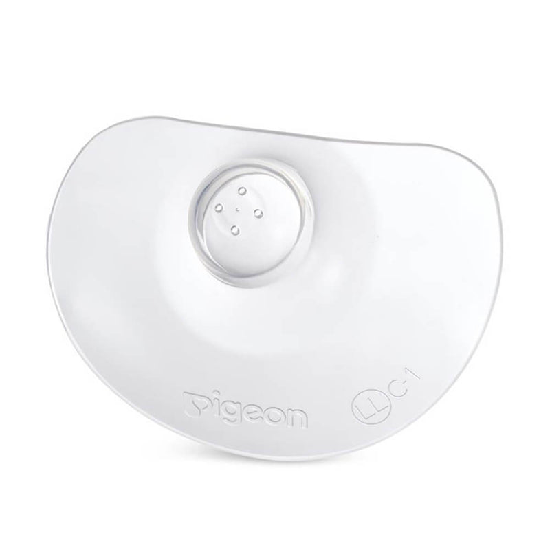 The Pigeon Silicone Breast Shield by Pigeon is a transparent silicone nipple shield with three small center holes, labeled "Pigeon L C1," designed to aid breastfeeding and help with latch-on difficulties.