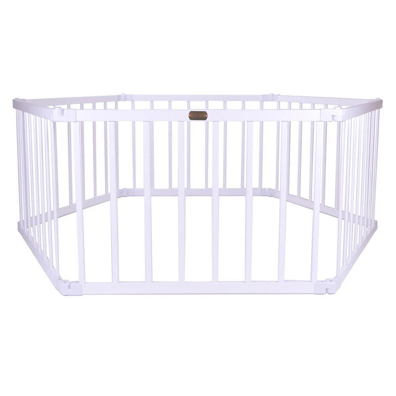 The Tikk Tokk Little Boss Playpen Hexagon by Tikk Tokk is a white, hexagonal wooden playpen with vertical bars, designed to safely contain babies or small children in a secure play environment.