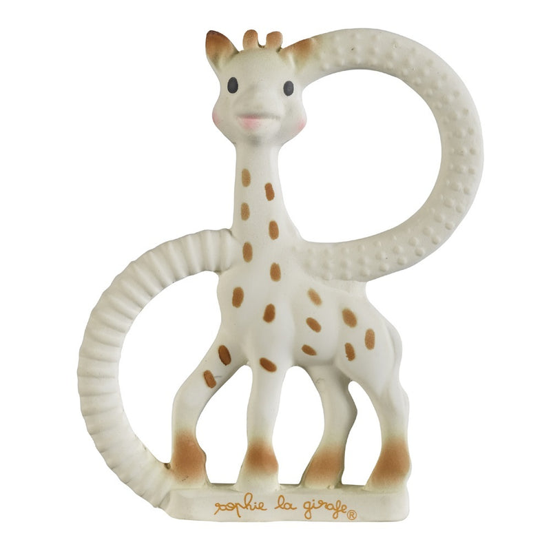 The Sophie La Girafe So Pure Teething Ring by Sophie features a soft, white and brown-spotted giraffe with two textured loops for easy grip and "sophie la girafe" at the base, providing gentle teething relief.