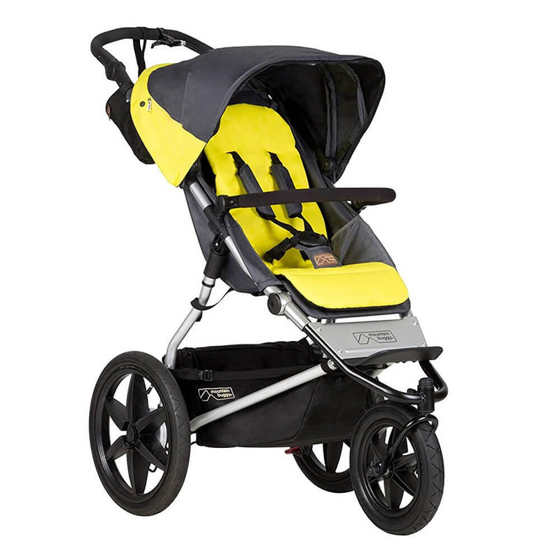 The Mountain Buggy Terrain by Mountain Buggy is a premium three-wheel jogger with a yellow seat, black harness, sun canopy, and large black tires—ideal for active families seeking an outdoor terrain buggy.