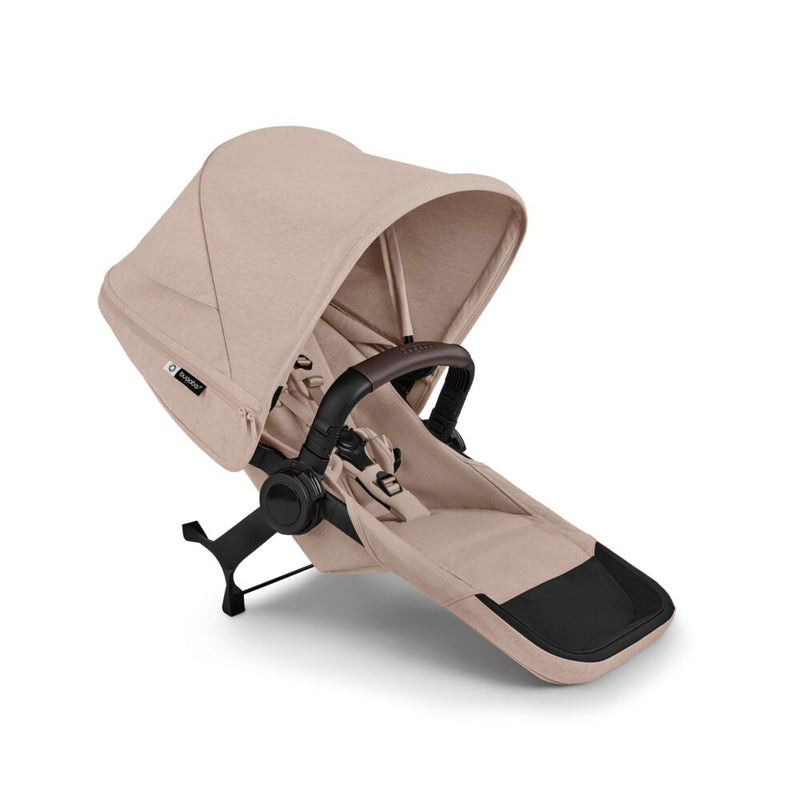 The Bugaboo Donkey 6 Duo Extension Set by Bugaboo features a beige stroller seat attachment with a large canopy, black harness bar, and adjustable recline—ideal for siblings or twins. Displayed on a white background.