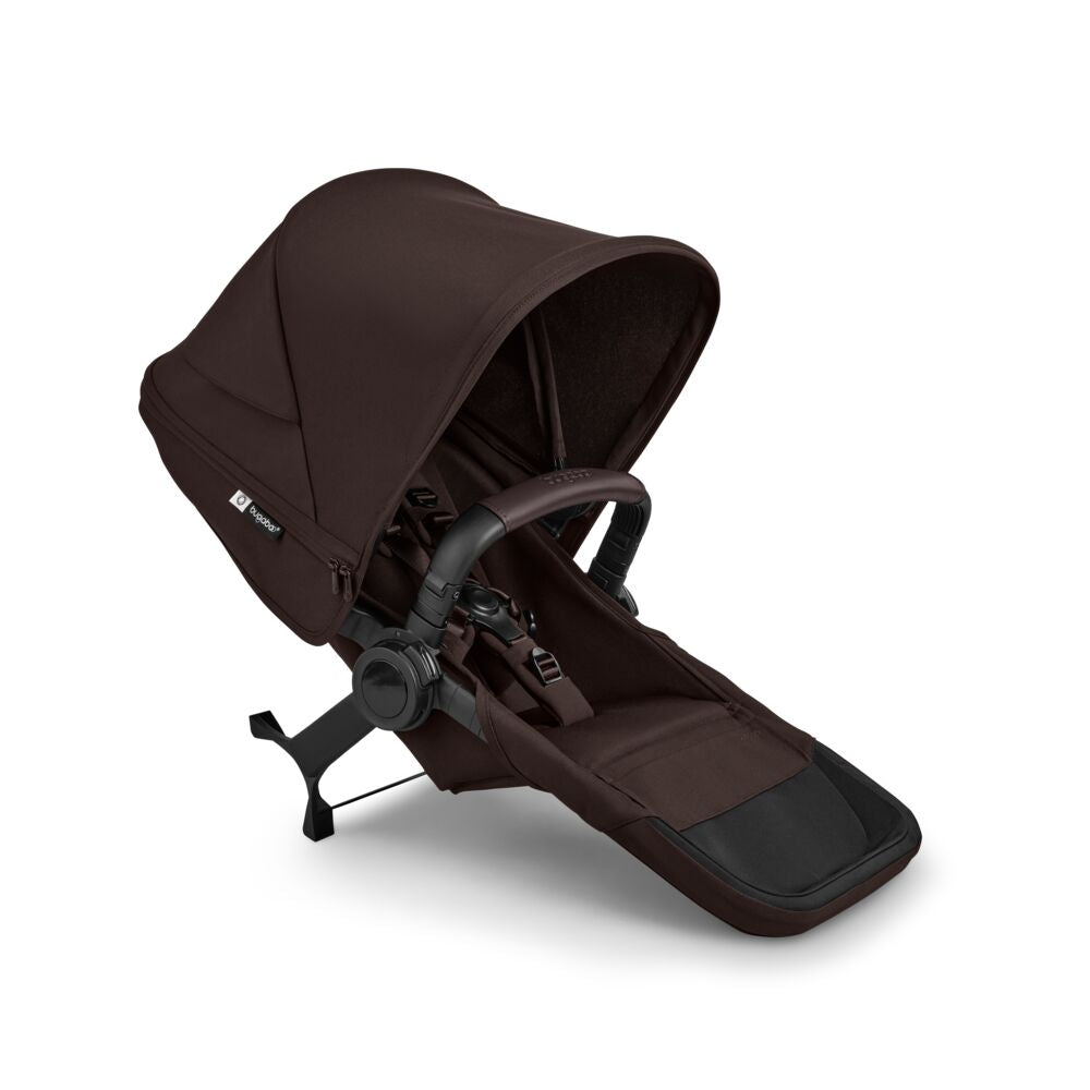 The Bugaboo Donkey 6 Duo Extension Set by Bugaboo is a dark brown stroller seat attachment with a canopy, safety harness, footrest, support legs for stability, and side adjustment mechanisms, shown on a white background.