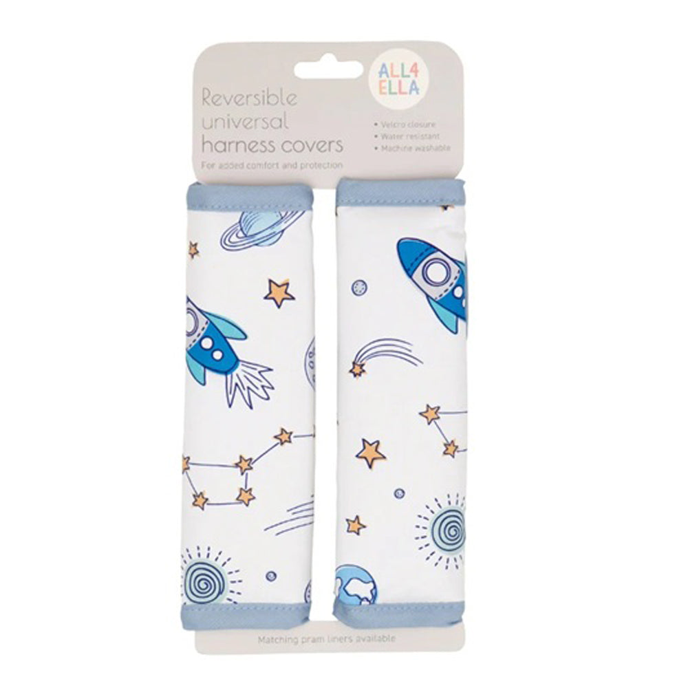 The All4Ella Harness Cover Blast Off features two reversible, universal covers with a rocket, star, and planet design in white with blue and yellow. Ideal baby travel accessories, they come packaged as "All4Ella.