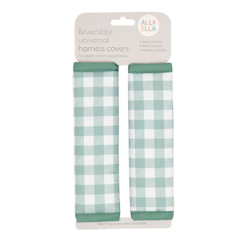 The All4Ella Harness Cover Gingham Sage features reversible, universal covers with a green and white check pattern—ideal for pram comfort and protection. Displayed on a branded cardboard backing.