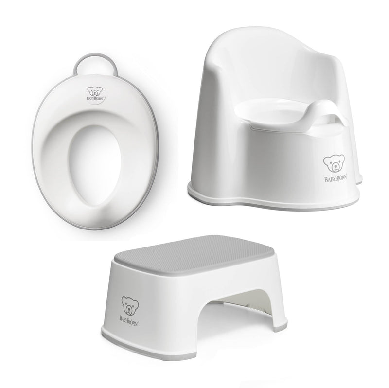 The BabyBjorn Toilet Training Bundle includes a white potty chair with backrest, a bear-logo toilet training seat, and a sturdy non-slip step stool—all from BabyBjorn for safe, comfortable toddler toilet training.