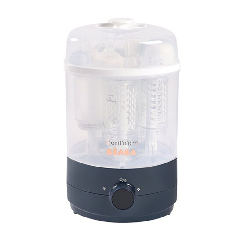 The Beaba 2-in-1 Steril n Dry Steriliser Dryer features a transparent dome lid, dark base, front dial with indicator symbols, and holds several bottles and accessories for fast, efficient sterilising and drying.