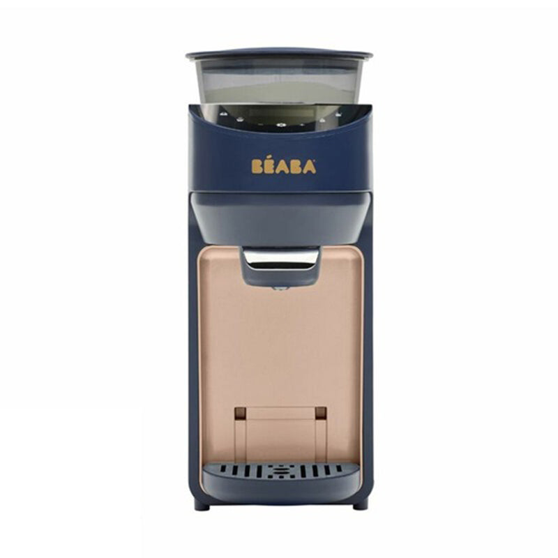 A Beaba Milkeo Plus Night Blue automatic bottle maker by Beaba, featuring a transparent top container, dispensing spout, and drip tray is shown against a plain white background.