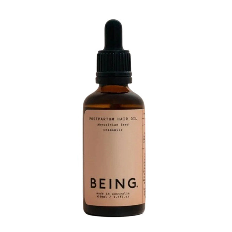 A 50ml brown glass dropper bottle of Being Skincare Postpartum Hair Oil from Being Skincare, made in Australia, features nourishing Abyssinian seed and chamomile for gentle postpartum hair care.