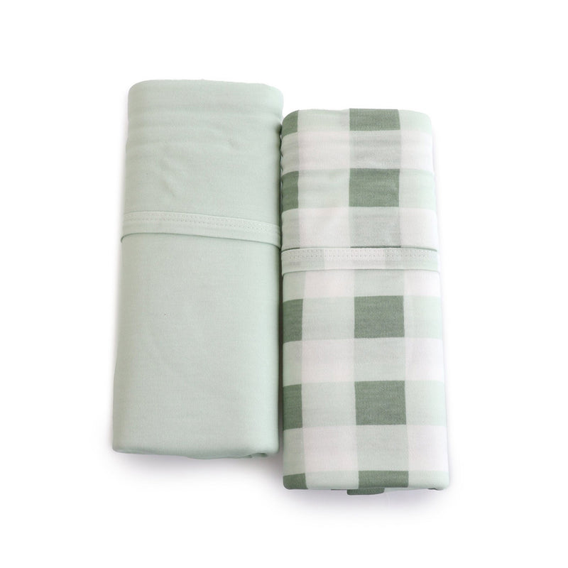 The Bubba Blue Bubba Sundae 2PK Jersey Swaddle Wraps, featuring one solid light green and one light green and white checkered wrap, are displayed side by side on a white background for a serene nursery touch.