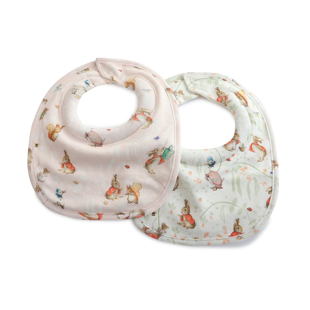The Bubba Blue Flopsy Mopsy & Cottontail 2PK Dribble Bibs feature playful rabbits and floral designs in pink and white. Waterproof and practical, these Bubba Blue bibs keep your little one clean at mealtime or while dribbling.