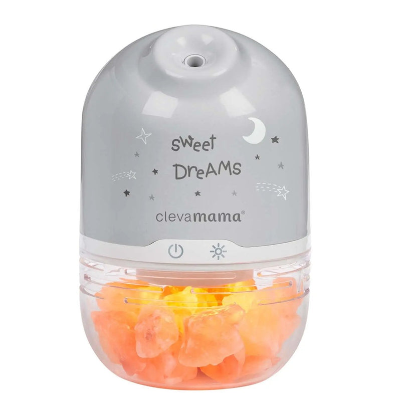 A gray Clevamama ClevaPure Salt Lamp baby humidifier and night light with "sweet dreams" and star illustrations, featuring orange Himalayan salt rocks at the base.