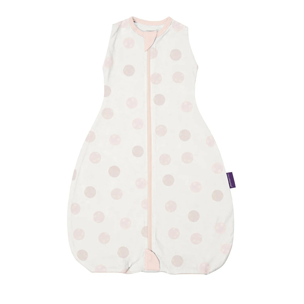 The Clevamama ClevaSleep DreamSuit 2.5 Tog Pink Spot is a sleeveless baby sleep sack with pink trim and large polka dots. This wearable sleepsuit by Clevamama features a front zipper for easy changes, ensuring cozy and comfortable sleep.