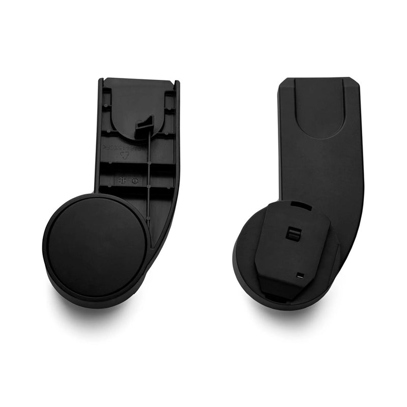 Two black, L-shaped Cybex Gazelle S Capsule Adapters with circular bases are shown—one upward, one downward—on a white background. Ideal for organizing your space or complementing compatible capsules from Cybex.