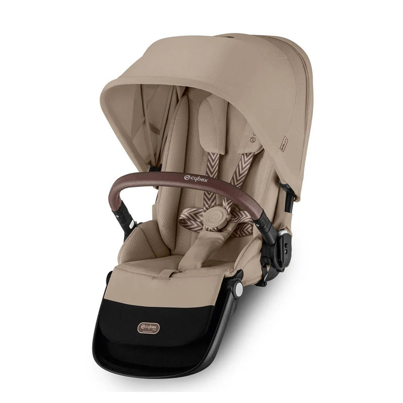 The Cybex Gazelle S Second Seat by Cybex is shown from the front, featuring a beige padded ergonomic lie-flat seat, UPF50+ sun canopy, harness, and a brown safety bar against a white background.