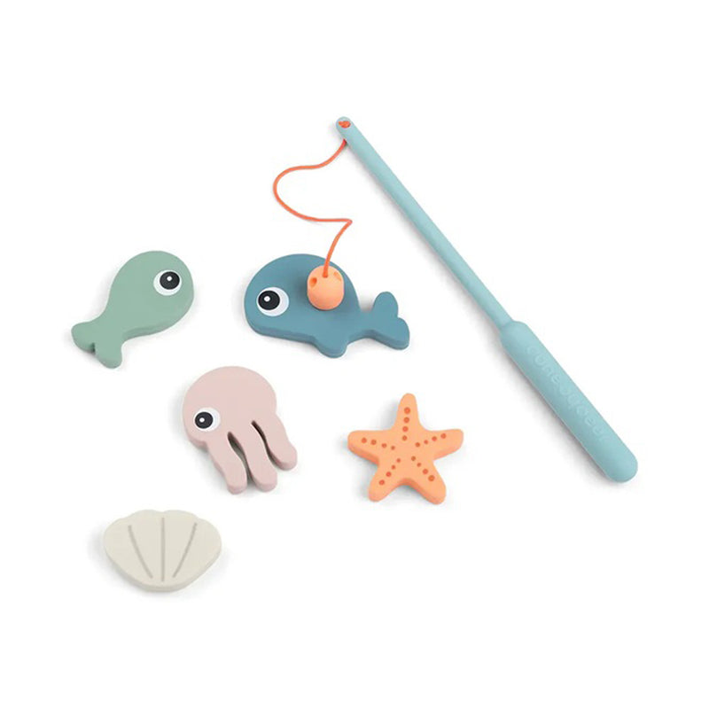 The Done By Deer Bath Fishing Toy Sea Friends by Done By Deer includes a magnetic rod and five soft silicone sea creatures—green fish, blue whale, purple octopus, orange starfish, and white seashell—for safe, engaging bath time fun.