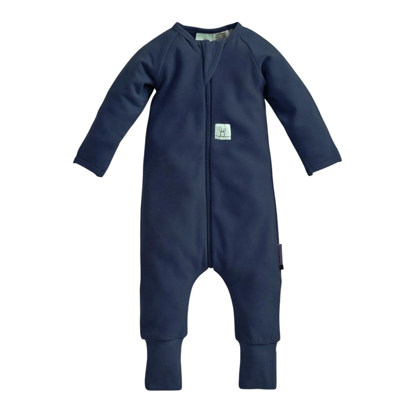 The ErgoPouch 1.0 Tog Layers Ink by ErgoPouch is a navy blue long sleeve baby bodysuit with legs, fold-over feet cuffs, front zipper, and a chest logo patch, shown laid flat on a white background.