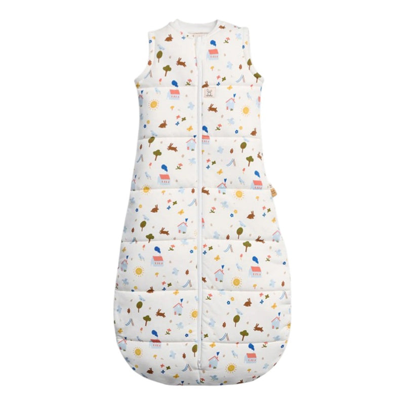 The ErgoPouch 2.5 Tog Sleeping Bag by ErgoPouch is a sleeveless, white organic cotton sleeping bag with a front zipper and colorful prints, offering quilted padding for comfort and warmth for your baby.