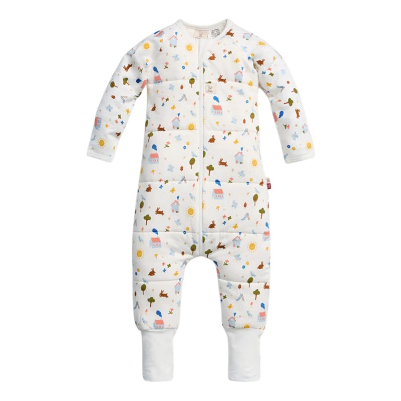 The ErgoPouch 3.5 Tog Sleep Onesie by ErgoPouch is a TOG-rated sleeping bag alternative with sleeves and legs, a front zipper, white cuffs, and a colorful animal, tree, and sun print on white organic cotton.