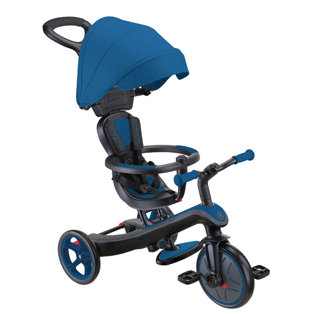 The Globber Explorer Trike 4 in 1 by Globber is a blue and black tricycle for young children, featuring a sun canopy, safety harness, footrests, and a parent push handle.