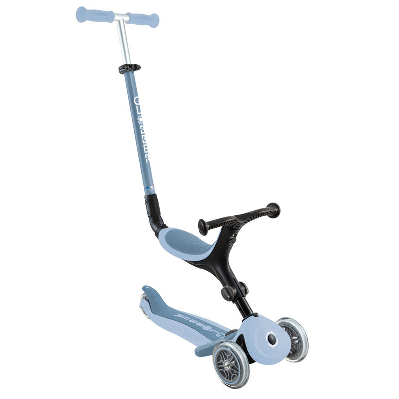 The Globber Go Up Active Ecologic by Globber is an eco-friendly blue and black toddler scooter with a seat, adjustable handlebars, footboard, two front wheels, and one rear wheel for stability—perfect for young riders.