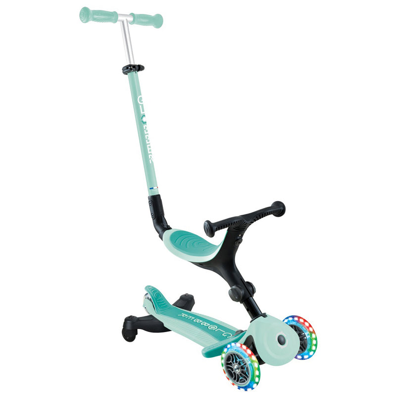 The Globber GO UP ACTIVE LIGHTS 360 by Globber is a teal and black 3-in-1 kids scooter featuring three wheels, front LED lights, a T-shaped handlebar, and a built-in seat for riding while sitting or standing.