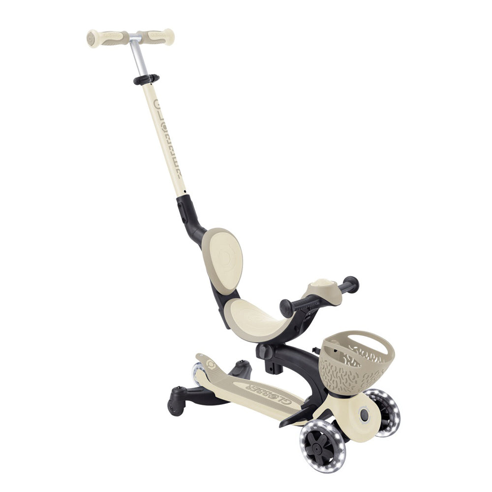 The Globber Go Up Baby Lights 360 by Globber is a beige and black 3-wheel scooter featuring a seat, handlebars, footrests, front basket, and an adjustable rear parent handle—ideal as a versatile toddler scooter or ride-on.