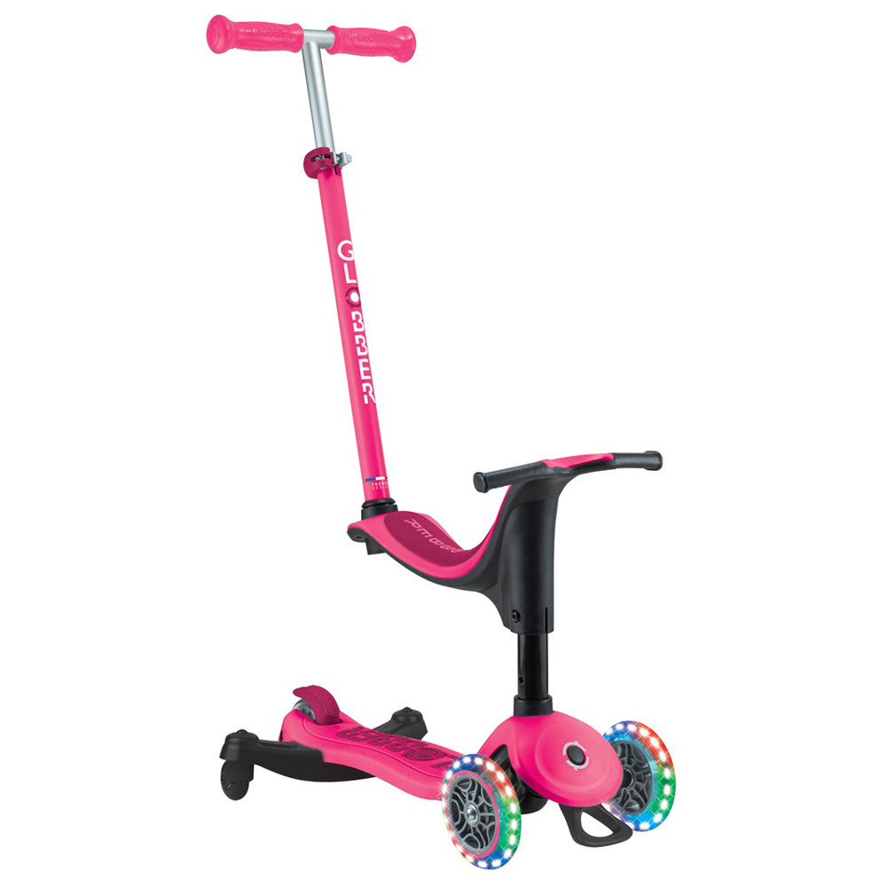 The Globber Go Up Sporty Lights 360 by Globber is a pink toddler scooter with seat, adjustable handlebar, light-up wheels, and "Glider" on the stem—ideal for fun rides and growing kids.