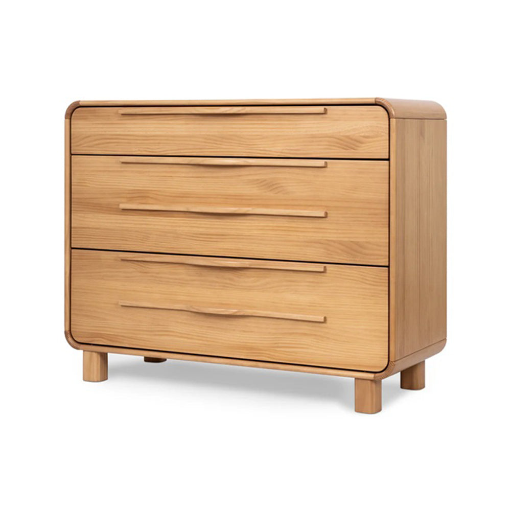 The Grotime Winslow Chest by Grotime is a light wood dresser crafted from New Zealand Pine, featuring three drawers, rounded corners, a minimalist design, and four short legs—ideal nursery furniture.