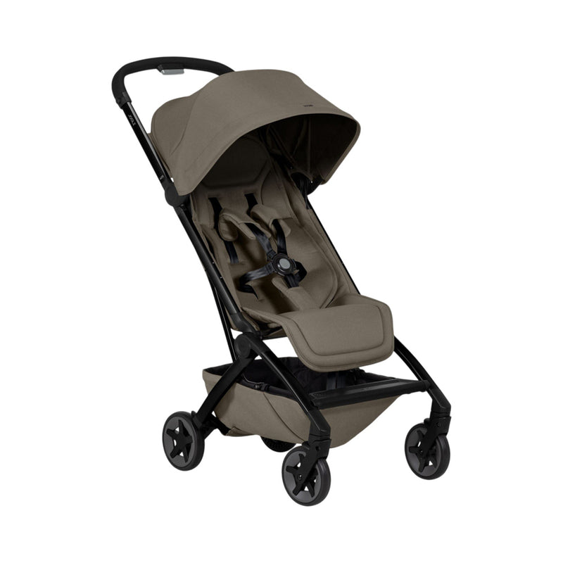 The Joolz Aer2 Stroller by Joolz is a modern, ultra-compact buggy with a brown canopy and seat, black frame, four wheels, storage basket, and easy one-hand fold—ideal for families on the move.