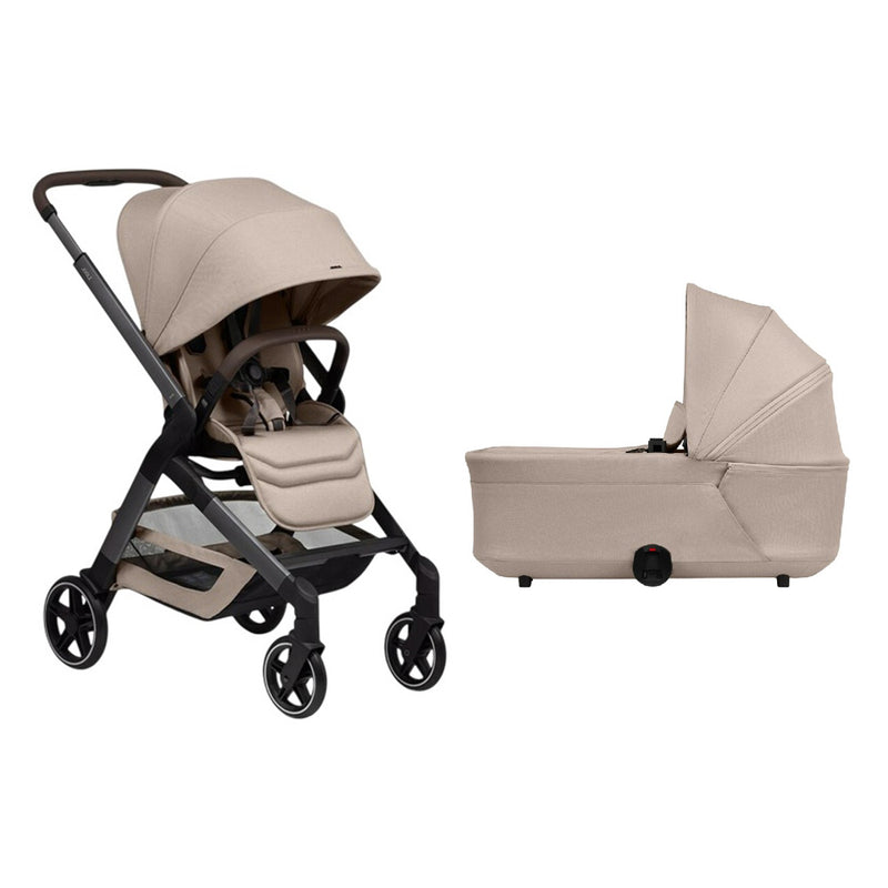 The Joolz Hub2 + Hub2 Bassinet Bundle by Joolz features a beige stroller with canopy and harness, paired with a matching lightweight carrycot. Both have black frames and are set against a white background.