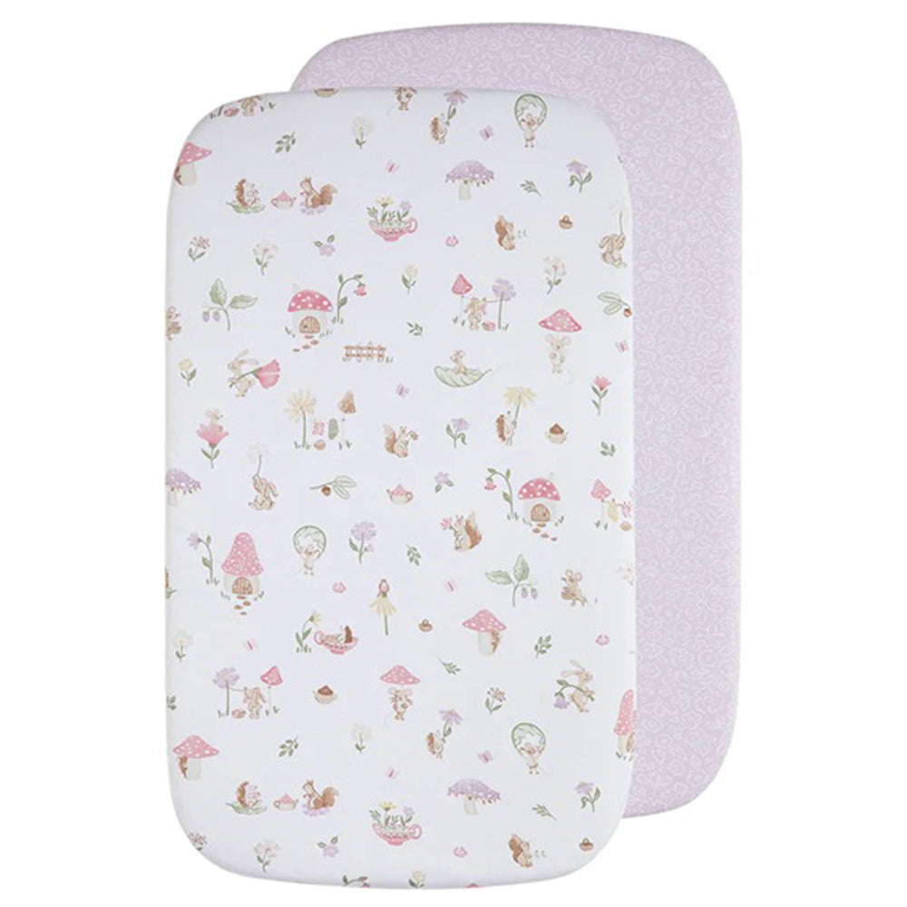 The Living Textiles Moses/Pram Fitted Sheet 2pk Whimsical Wonderland includes two 100% cotton jersey sheets: one with woodland designs and one in light pink with a subtle pattern, perfect for moses baskets or pram bassinets.