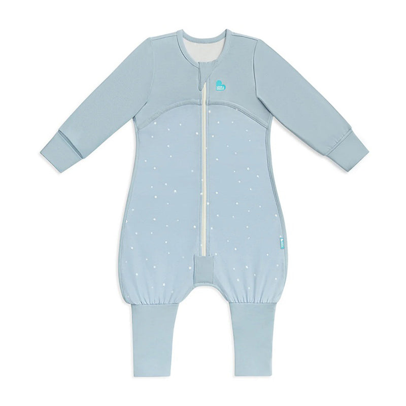The Love To Dream Sleep Suit 1.0T Stretch Cotton Twinkle Powder Blue features long sleeves, a front zipper, leg cuffs, and a subtle dotted pattern with a small teal logo on the chest, shown laid flat on a white background.