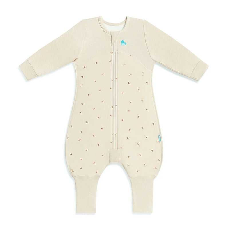 The Love To Dream Sleep Suit 1.5T Stretch Cotton Fleece Twigs Oatmeal is a beige toddler sleep suit with long sleeves, front zipper, fitted cuffs, and small pattern. It’s a 1.5 TOG wearable blanket with legs and blue chest logo.
