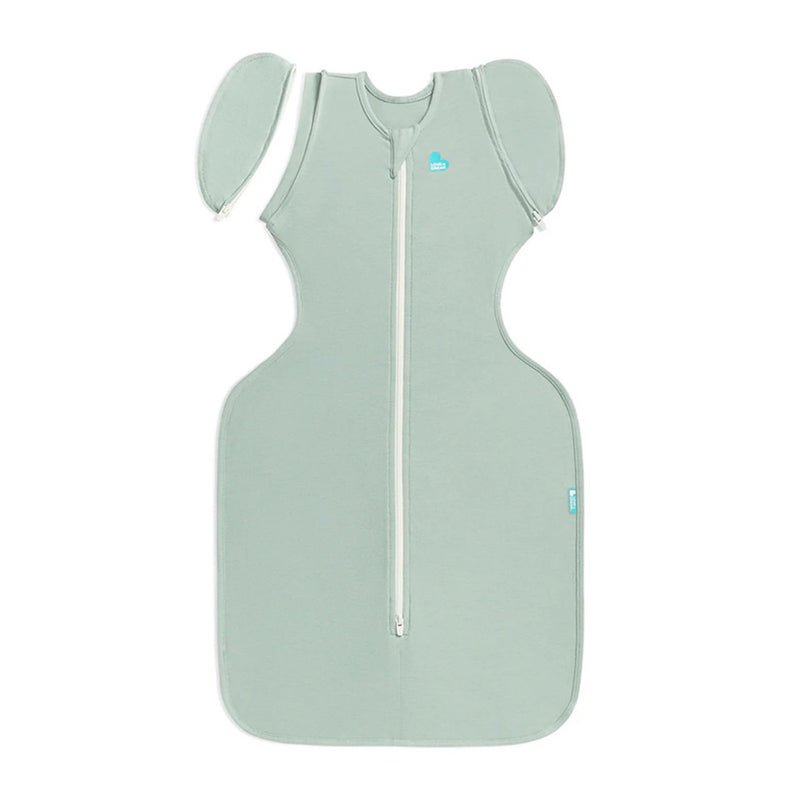 The Love To Dream Swaddle Up Transition Bag 0.2T in Stretch Cotton Olive features a fitted top, flared bottom, front zipper, and signature wing-shaped arm sections for comfortable swaddling.