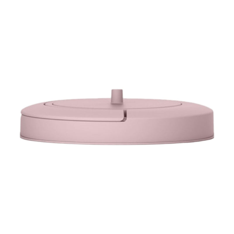 The Magic Magestic/Thoth Bin Lid by Magic is a round, flat, light pink lid with a central knob and curved groove—perfect as a stylish nappy bin or bathroom bin accessory.