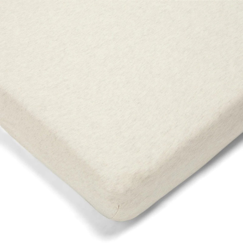Close-up of the Mamas & Papas Cot Fitted Sheet Set 1pk Oatmeal, showing its smooth 100% cotton fabric and snug fit around a cot mattress edge.