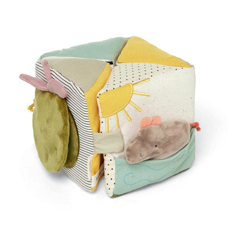 The Mamas & Papas Folding Activity Cube is a soft, colorful sensory toy featuring various textures, patterns, and plush mouse, sun, and dragonfly—perfect for babies and toddlers to explore during tummy time and develop motor skills.