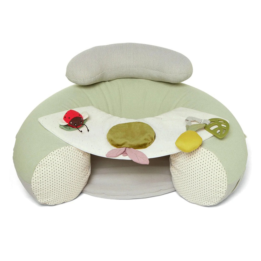 The Mamas & Papas Sit & Play Baby Floor Seat is a soft green and cream infant seat with a supportive backrest and attached play tray featuring safari toys, including a red ladybug and yellow rattle.
