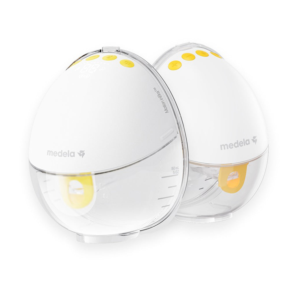 Two Medela Motion InBra Wearable Pump Double breast pumps, oval-shaped in white and clear with yellow buttons, stand side by side against a white background.