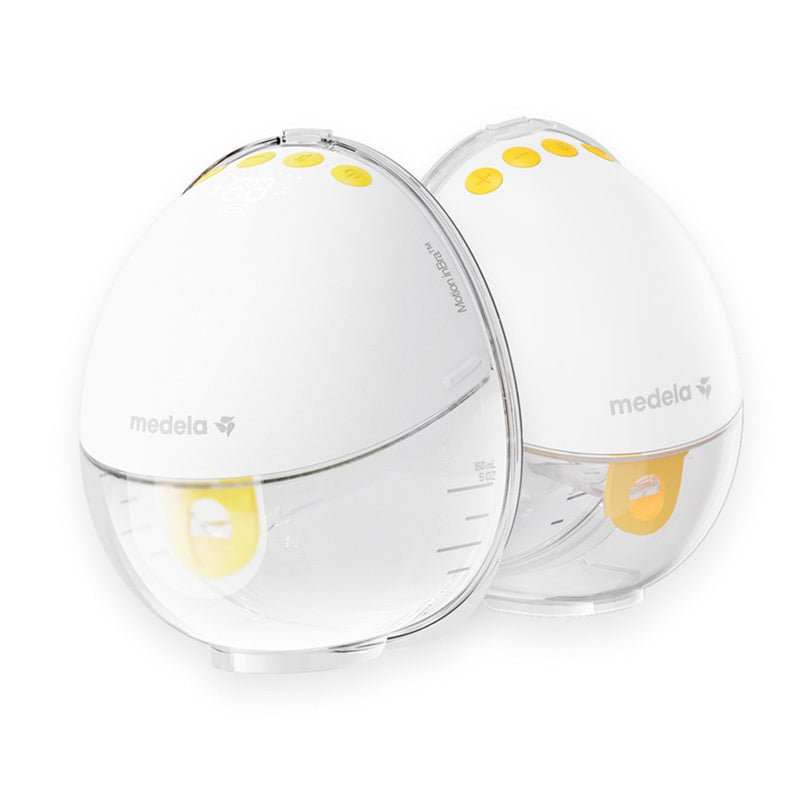 Two Medela Motion InBra Wearable Pump Double breast pumps, oval-shaped in white and clear with yellow buttons, stand side by side against a white background.