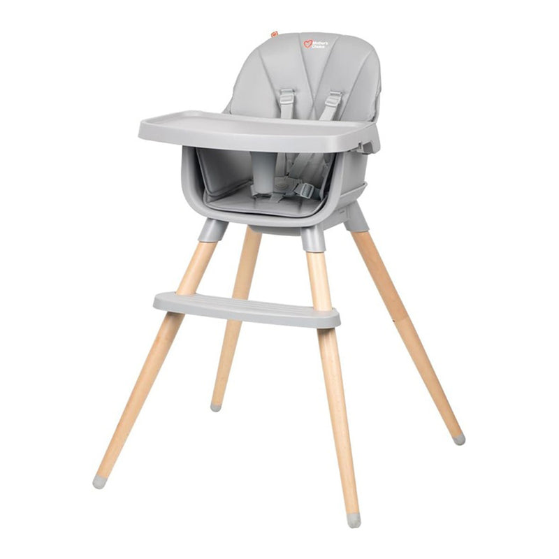 The Mothers Choice Willow 4 in 1 Highchair features a modern gray plastic seat, safety harness, removable tray, footrest, and light wooden legs. Its simple Scandinavian design by Mothers Choice suits both infants and toddlers.
