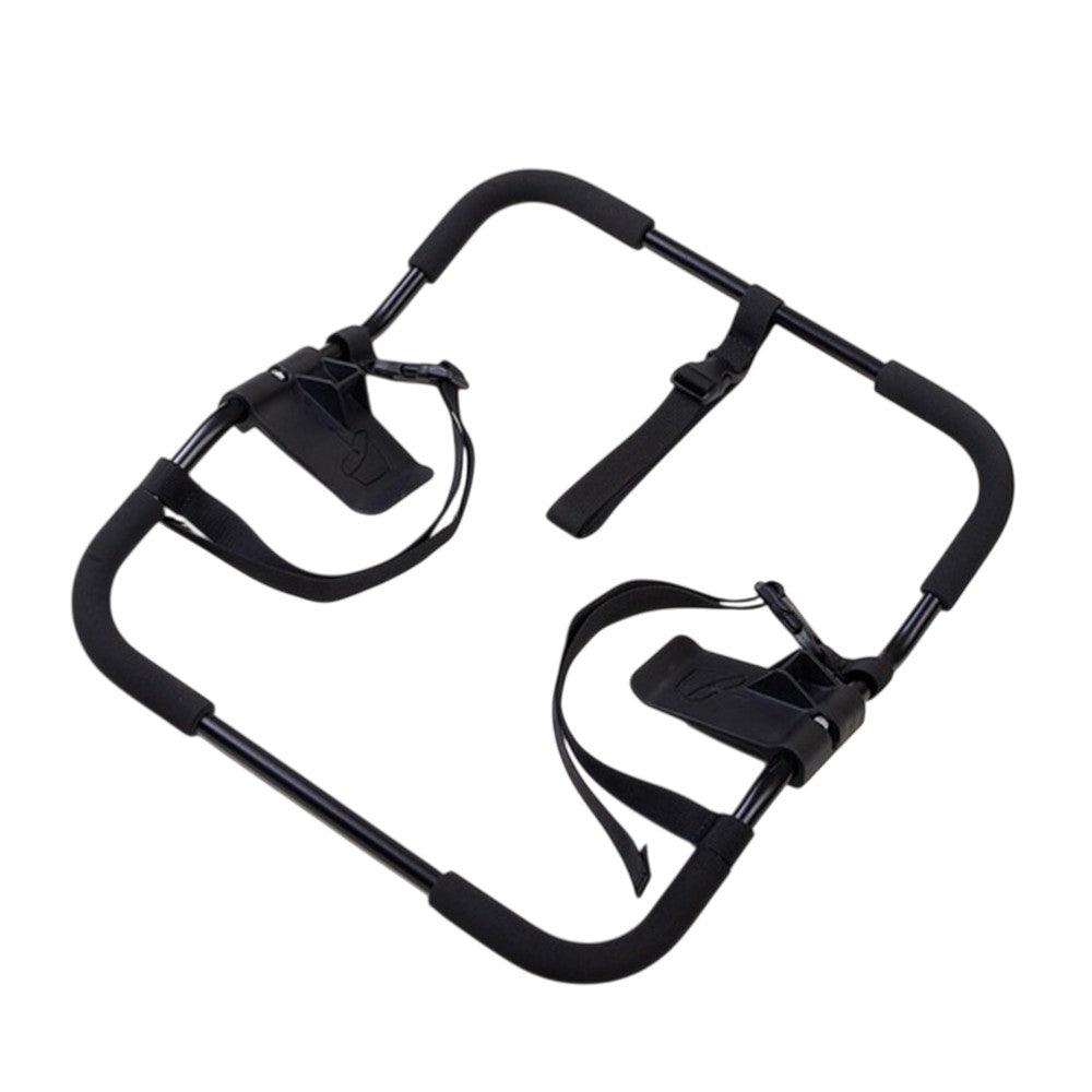 The Mountain Buggy Universal Car Seat Adaptor for V4 Urban Jungle and Terrain, a black metal frame with foam padding and adjustable straps, is shown on a white background.