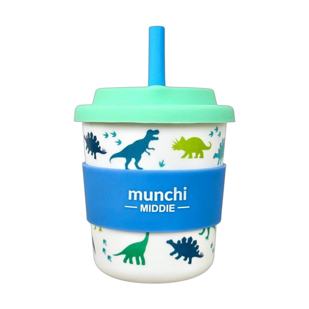 The Munchi 8oz Middie Cup for kids features green and blue dinosaur illustrations, a teal lid, reusable silicone straw, and a blue grip with "munchi MIDDIE" text.