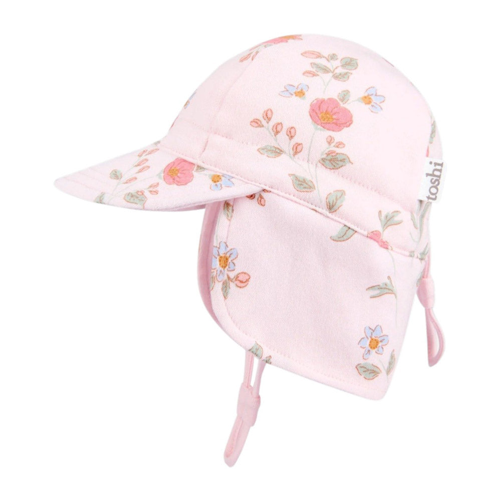 The Toshi Flap Cap Harvest Cottage Garden is a light pink baby sun hat with a floral pattern, UPF 50+ protection, wide brim, neck flap, ear coverage, and chin straps—perfect for secure sun protection.
