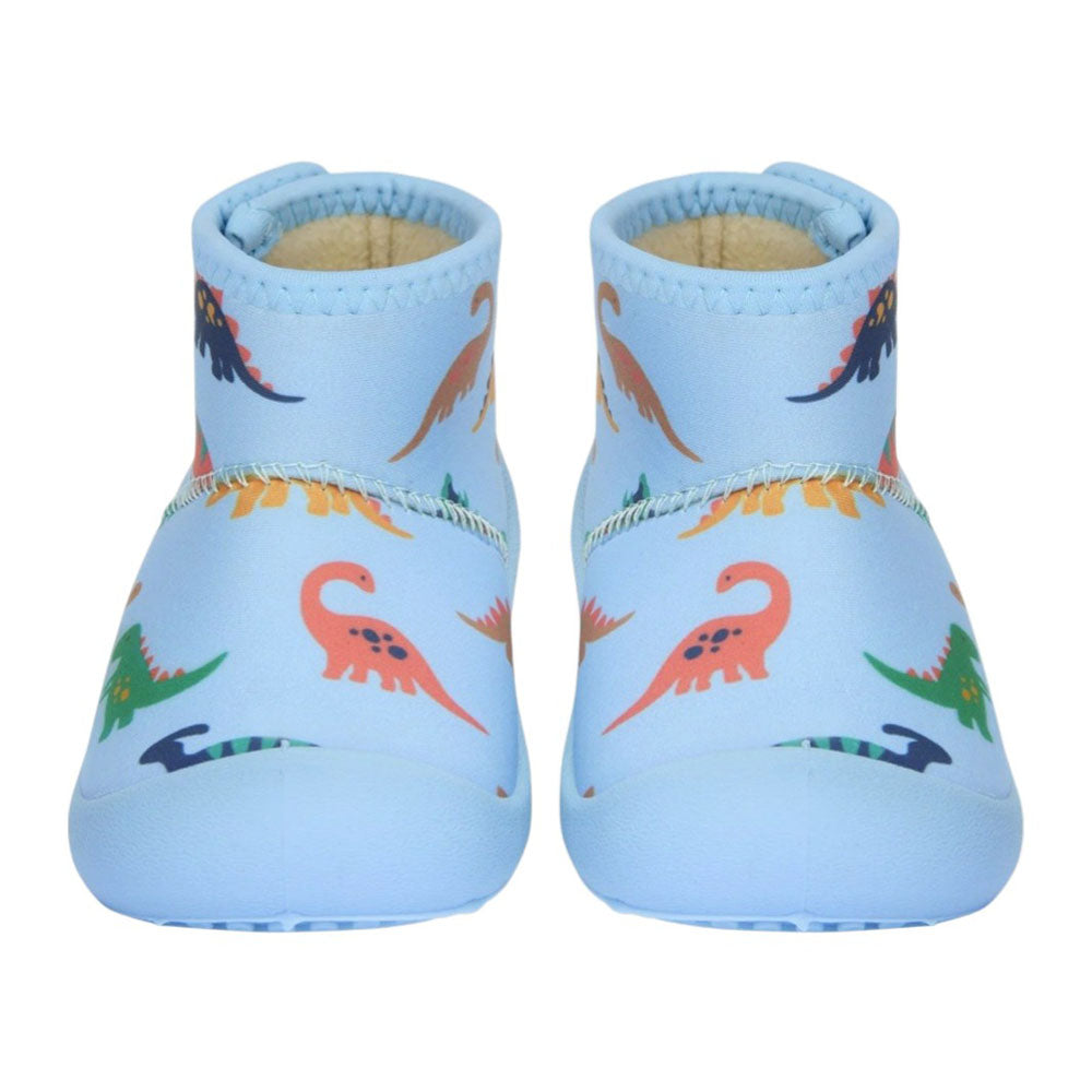 Toshi Gumbooties Neoprene Mystical Dino Bubs are light blue, water-repellent baby booties with colorful orange, green, and navy dinosaur illustrations—perfect for little explorers.